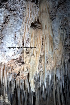 Draperies and Stalagtites hanging from the ceiling in Lower Cave, Carlsbad Cavern.