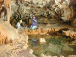 Picture of Diana Northup and Penny Boston Studying a Cave Pool Community